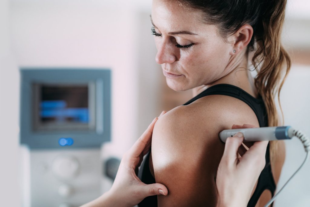Non Surgical Spinal Decompression Therapy Near me - image cropped-hands-massaging-patient-shoulder-hospital-FILEminimizer-1024x683 on https://trydecompression.com